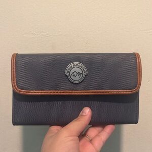 White Mountain Navy Wallet with Brown Trim and Logo Badge